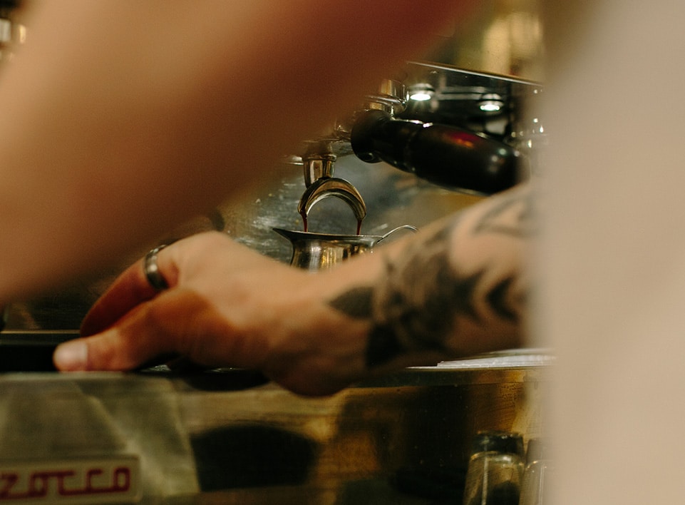 roy brady of blueprint coffee works on the la marzocco linea pb