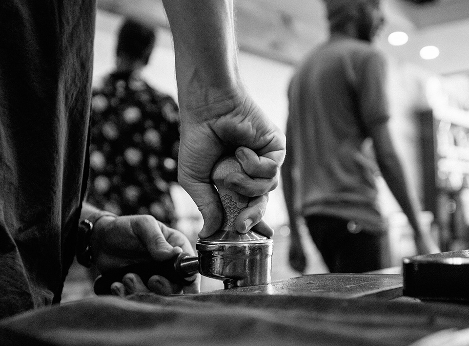 Kevin Reddy prepares a shot of espresso at Blueprint Coffee.