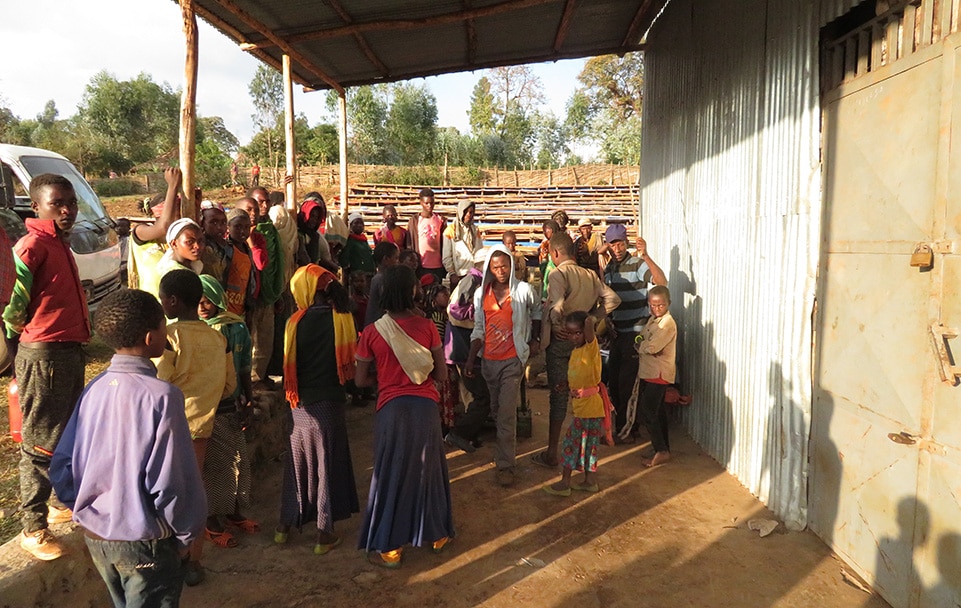 Washing stations are busy places at the end of the day as much of the community congregates to sell their day's harvest.