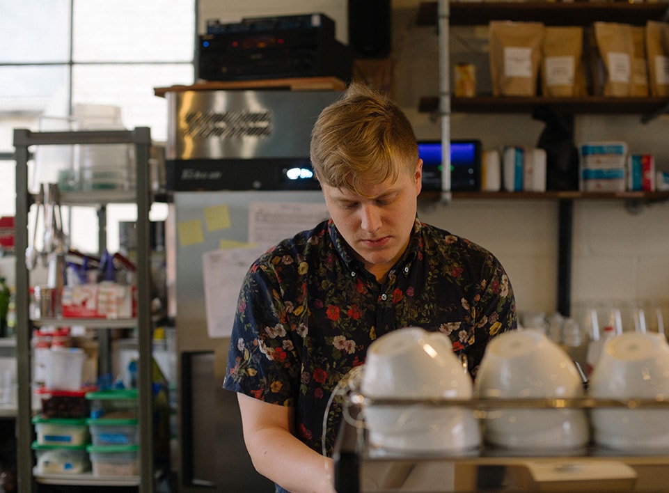 Next, alex steams milk on the La Marzocco espresso machine.