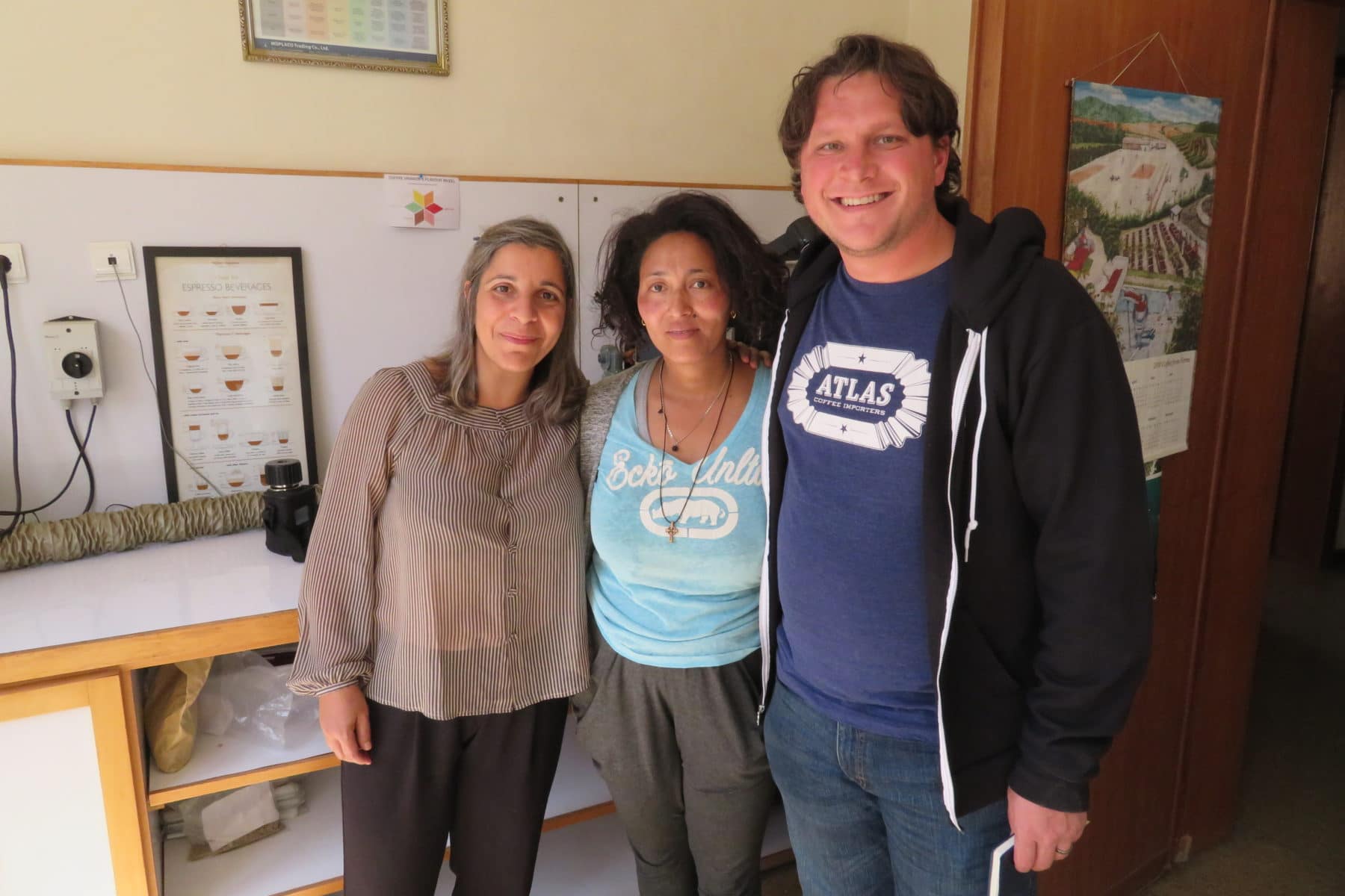 Blueprint member Mike Marquard poses with Heleanna Georgalis and Hana Kassahun Biligin of Moplaco, one of Blueprint's coffee sourcing partners in Ethiopia.