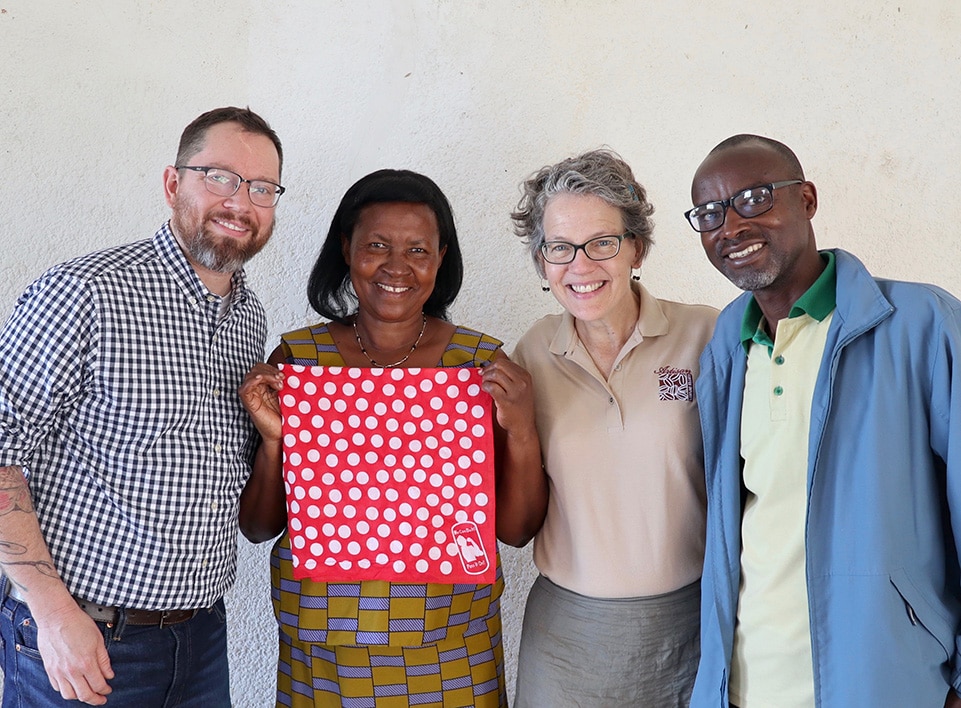 From left to right: Me, Marthe Uwiherewenimana - Ejo Heza Coop president, Ruth Ann Chruch, Gervais Karitare - Executive Director Kopakama.