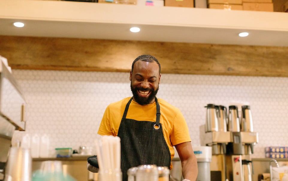 El Strickland smiles while working at Blueprint Delmar