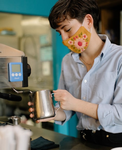 Mac uses an espresso machine to froth milk