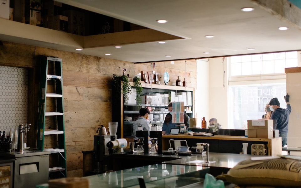 Mac assists customers at Blueprint Coffee Delmar